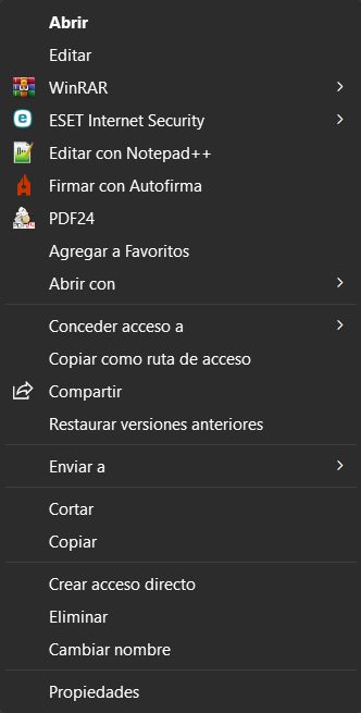 Menú contextual clásico con todas las entradas visibles, incluidas WinRAR, Notepad++ y Enviar a.