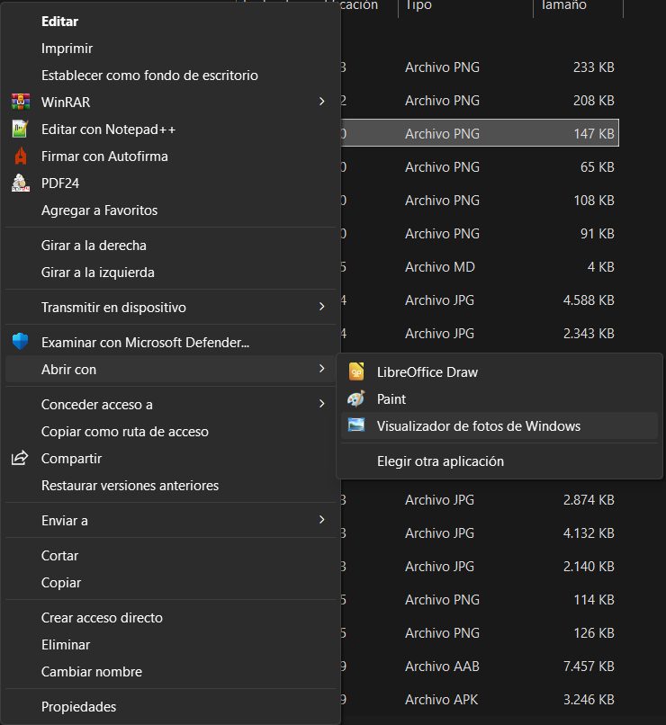 Menú del clic derecho sobre un PNG con el submenú Abrir con desplegado y la opción Visualizador de fotos de Windows junto a Paint y LibreOffice Draw.