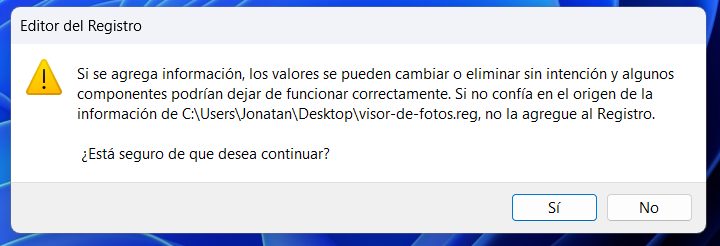 Aviso del Editor del Registro preguntando si se desea continuar al agregar la información de visor-de-fotos.reg.